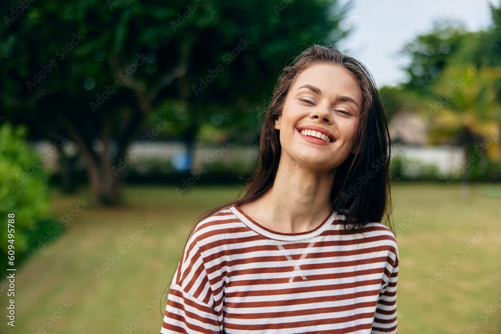 smiling woman park nature t-shirt black walk summer lifestyle freedom beautiful smiling woman park nature t-shirt black walk summer lifestyle freedom beautiful