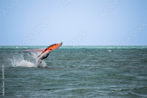 Surfers on beach in Torremolinos, Spain on May 28, 2023