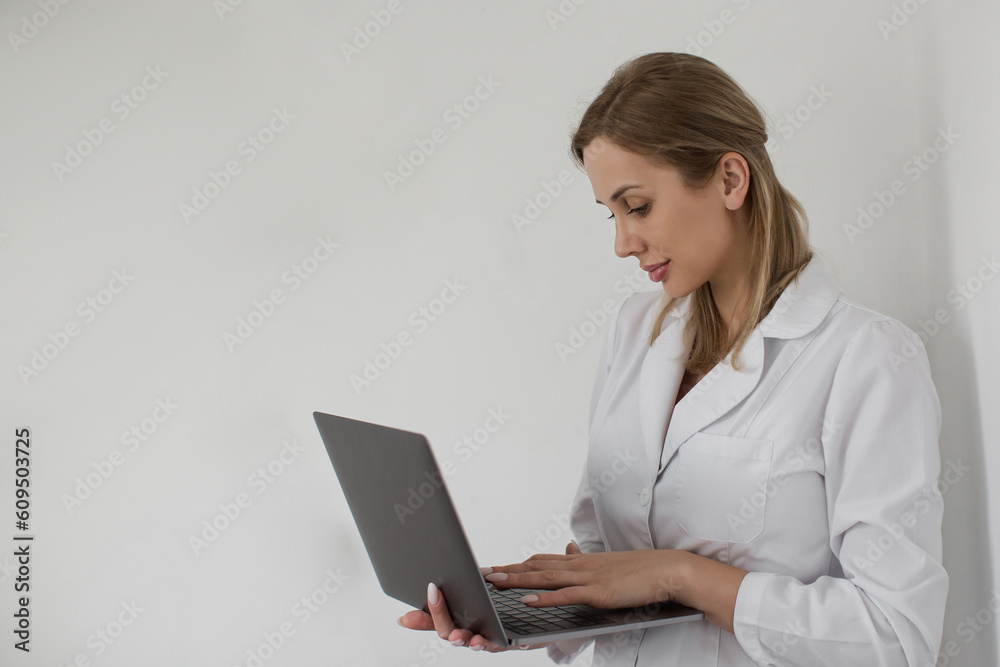 Photo of professional doc lady working with modern technology notebook laptop writing notes patient prescription wear stethoscope white lab coat Photo of professional doc lady working with modern technology notebook laptop writing notes patient prescription wear stethoscope white lab coat