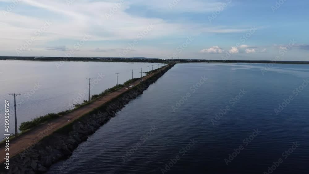 Small dirt road as a deck on beautiful river Small dirt road as a deck on beautiful river