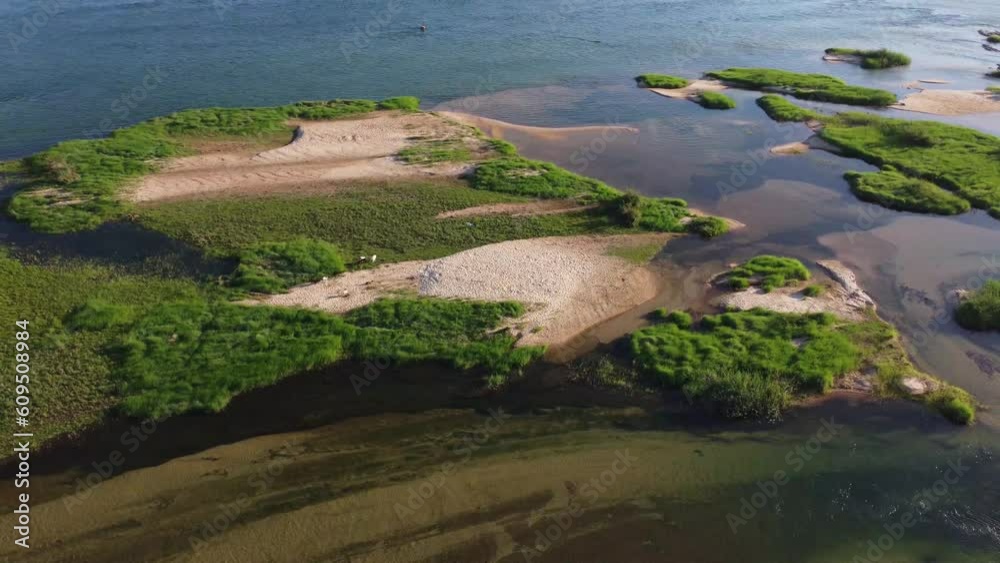 Incredible aerial image of the beautiful green river with the bank of yellowish sands of San Francisco in northeastern Brazil Incredible aerial image of the beautiful green river with the bank of yellowish sands of San Francisco in northeastern Brazil