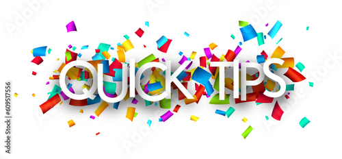 Quick tips sign over cut out ribbon confetti background.