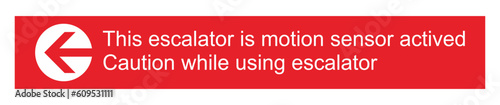 Sign This escalator is motion sensor actived caution while using escalator. safety sign red, arrow sign