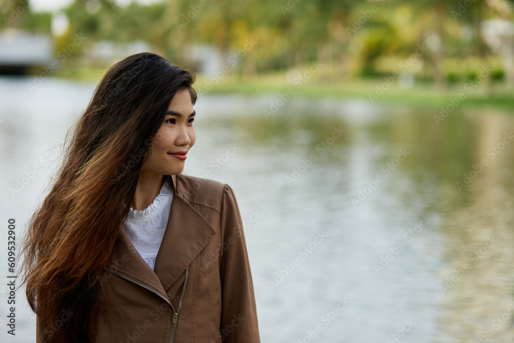 Vietnamese woman in the park during lunchtime in Vietnam. Vietnamese woman in the park during lunchtime in Vietnam.