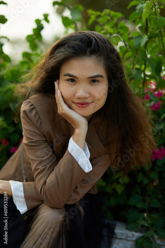 Vietnamese woman in the park during lunchtime in Vietnam.