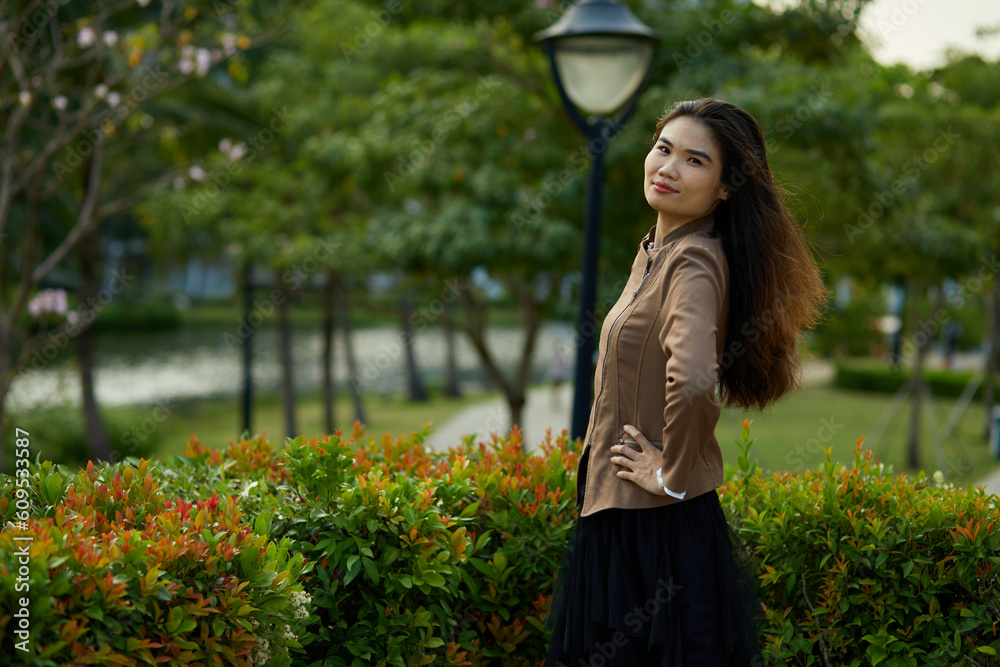 Vietnamese woman in the park during lunchtime in Vietnam. Vietnamese woman in the park during lunchtime in Vietnam.