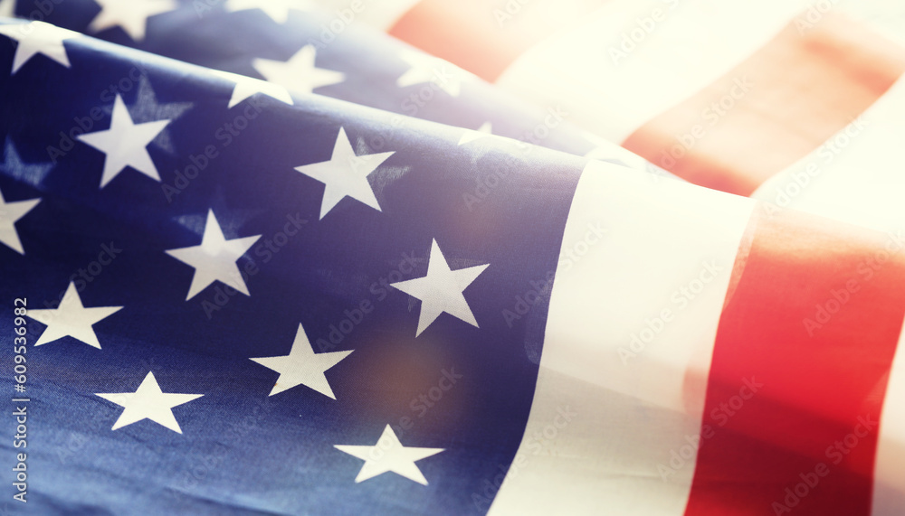 Fototapeta premium American flag waving in the wind. American Flag Wave Close Up for Memorial Day or 4th of July