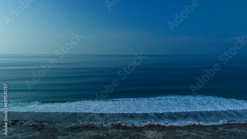 Aerial view with beach in wave of turquoise sea water shot, Top view scene background