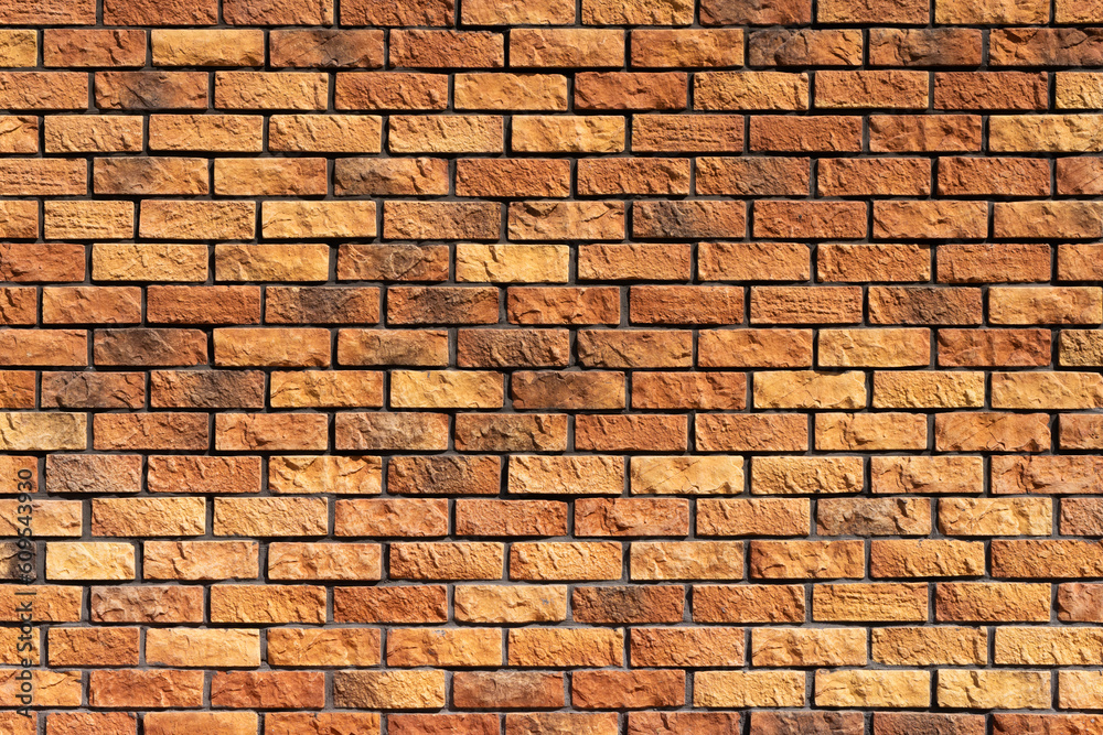 Different shades of ready and a changing pattern red brick wall Different shades of ready and a changing pattern red brick wall