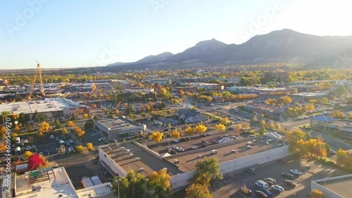 Nature's Fall Symphony: Behold the stunning tapestry of Boulder, Colorado, as it transforms into a kaleidoscope of autumn hues in this breathtaking drone footage