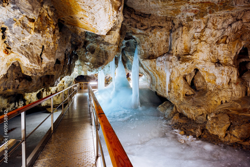 Incredible underground world of the Demanovska ice cave with ice pillars. Low Tatras National Park, Slovakia, Europe.