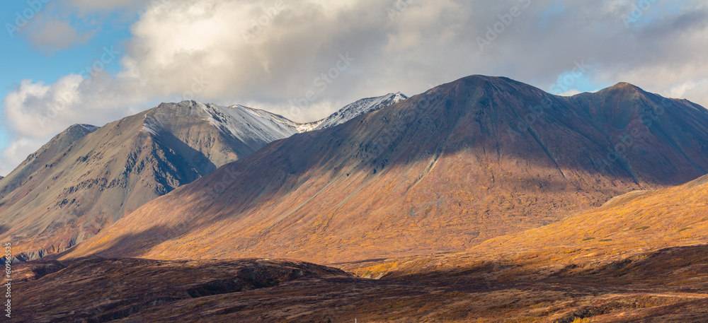 Panorama of a mountain landscape in brown autumn colors, Kluane National Park, Canada