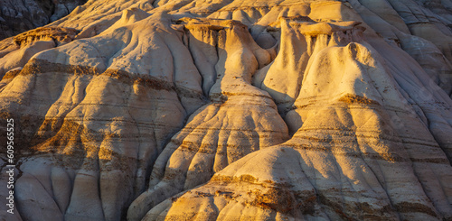 Bild auf Leinwand Close-up in panorama format of the barren eroded hills in the badlands along the
