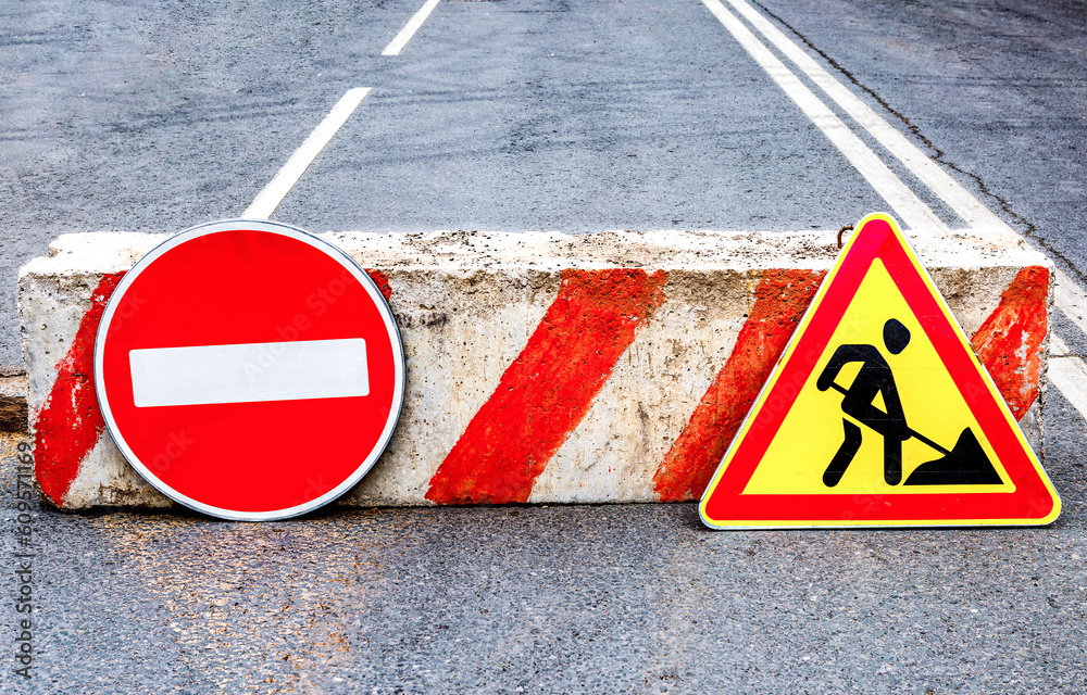 Road works sign at the city street Road works sign at the city street