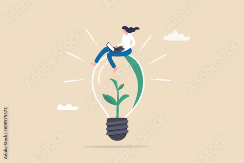 Sustainability business or environmental care in office, ecology company culture or social responsibility strategy, ESG concept, businesswoman working with computer on green sustainable lightbulb.