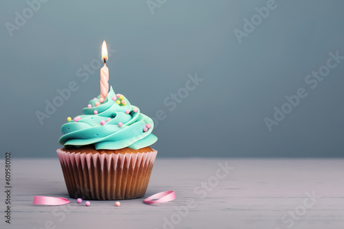 A cupcake with blue frosting and a lit candle background generative ai  © Backgroundbliss
