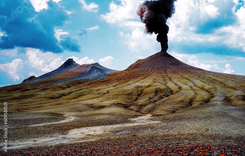 Mud volcanoes. with smoke eruption photo