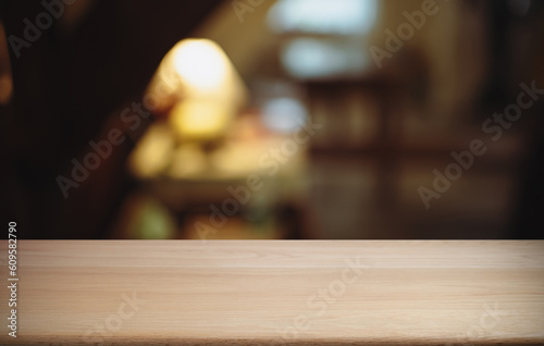 Empty wood table top and blur of out door garden background Empty wooden table space for text marketing promotion. blank wood table copy space for background