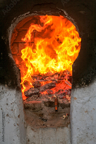 Tongues of flame in a stone oven
