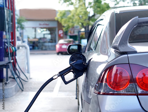 Photos Car refueling service is in progress.