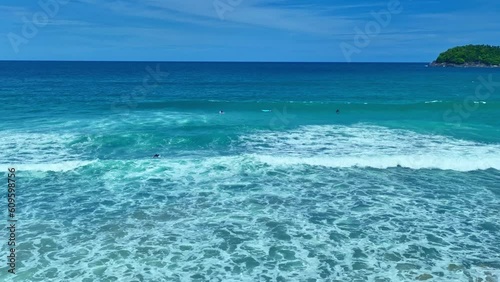 Landscape Beach Sea, Phuket, Thailand. Landscape view of beach sea sand and sky in summer day. .Beach space area. At Kata Beach, Phuket, Thailand. .4K UHD 50 frame per second. Video slow motion Clip photo