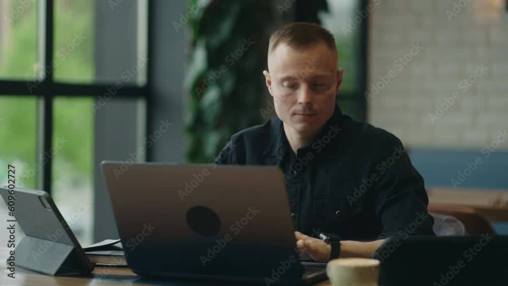 Smart Man Working With Different Gadgets In Cafe Or Co-Working, Web Developer Working Remotely Smart Man Working With Different Gadgets In Cafe Or Co-Working, Web Developer Working Remotely
