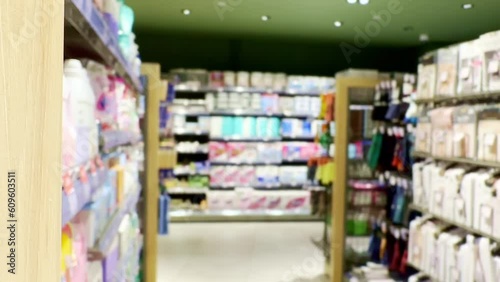 Wallpaper Mural Choosing a dairy products at supermarket.Grocery stores .blurred background Torontodigital.ca