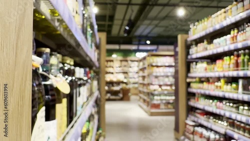 Wallpaper Mural Choosing a dairy products at supermarket.Grocery stores .blurred background Torontodigital.ca