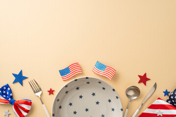 Stars of Freedom celebration menu. Top view of table setting, plate, cutlery, sparkle stars, headband, necktie, bow-tie, national flag on beige background with empty space for text or advert