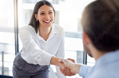 Female professional, welcome and shaking hands during a meeting at a company for collaboration. Business, woman and introduction at the office have a deal or an agreement for working with employer.