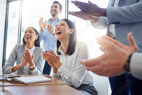 Fototapeta Motivation, audience with an applause and in a business meeting at work with a lens flare together