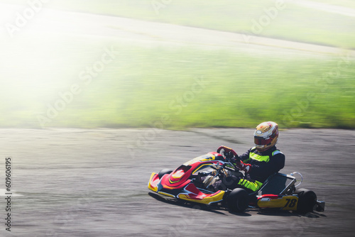 panning of a fast pass of a racing go kart