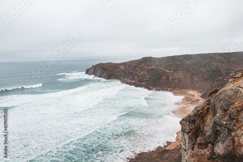 Stormy weather over the rocky cliffs of southwest Portugal's Algarve region. The power of the ocean. Wandering the Fisherman trail, Rota Vicentina photo