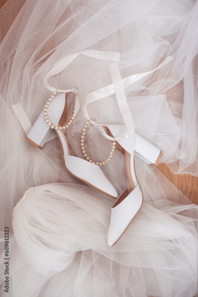Wedding white shoes of the bride. Wedding accessories Wedding white shoes of the bride. Wedding accessories