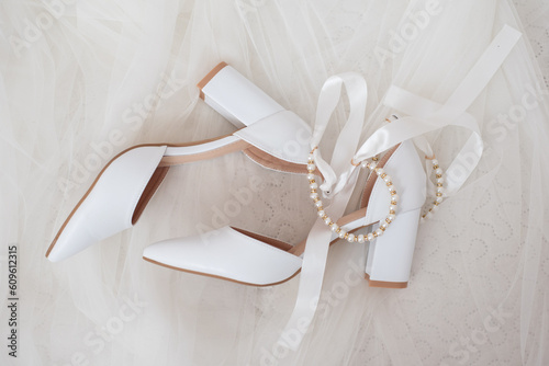 Wedding white shoes of the bride. Wedding accessories