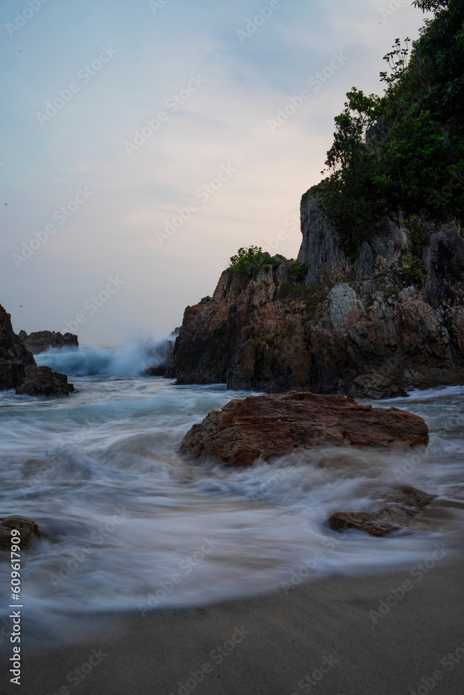 photo of a beach and waves motion at the beach daylight good for background