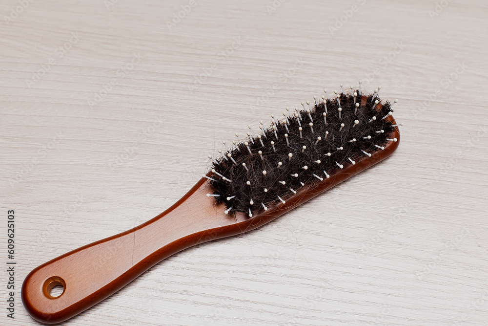Hair loss on the wooden comb, hair loss problem. Hair loss on the wooden comb, hair loss problem.