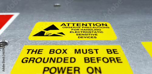 Standard caution label with text for Electrostatic Sensitive Devices (ESD) attached on electronic box,Special label symbol for electrostatic sensitive devices.