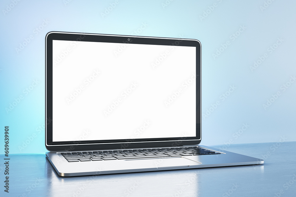 Creative blue designer workplace with blank white mock up laptop monitor. 3D Rendering. Creative blue designer workplace with blank white mock up laptop monitor. 3D Rendering.