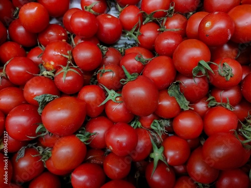 piles of tomatoes fresh that are sold in supermarkets  shopping for a month s needs for cooking