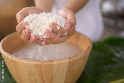 Preparing sticky rice in steamer for cook ,Sticky rice with mango , glutinous rice , northeastern of thailand food.