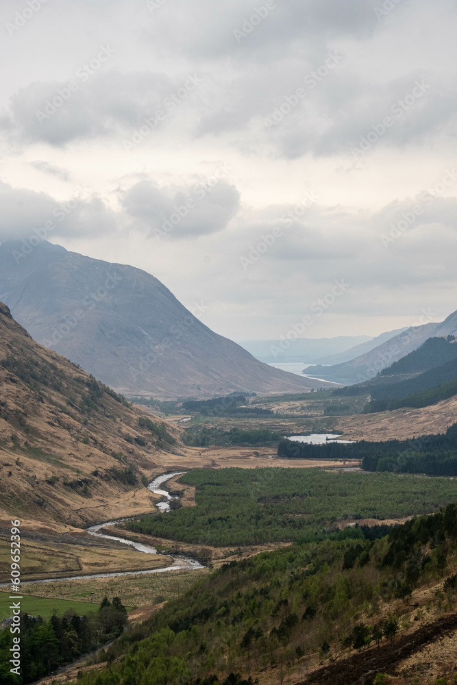 Naklejka premium Landscape of the Scottish West Highlands, Rocky Hills, Munroes, Misty snow-capped Mountains