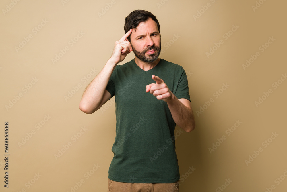 Thoughtful mid-adult man thinking and making good decisions