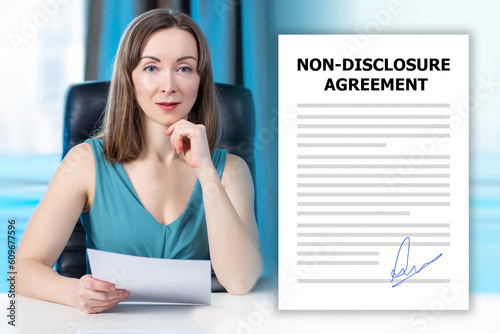 Woman and NDA contract. Non-disclosure agreement. Businesswoman is looking at camera. NDA document. Agreement on non-disclosure of important data. Business woman with NDA contract. photo