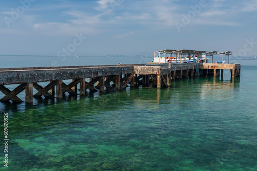 Ko Man Nai port with tourist ship on turquoise sea, Rayong © Blanscape