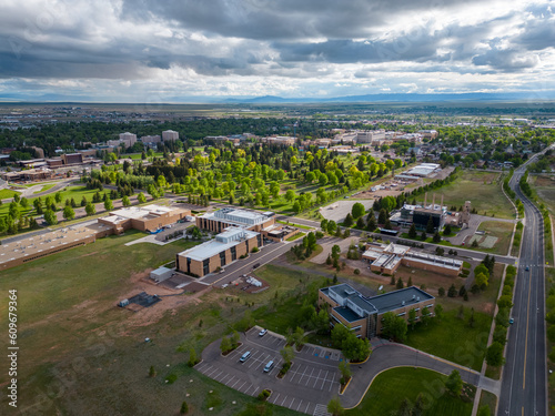Buildings and green trees in Laramie Wyoming from aerial drone perspective © christian.bitzas
