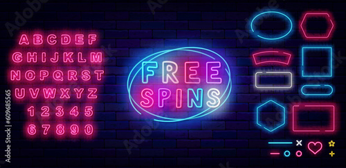 Free spins neon label. Jackpot sign. Shiny pink alphabet. Geometric frames collection. Vector stock illustration