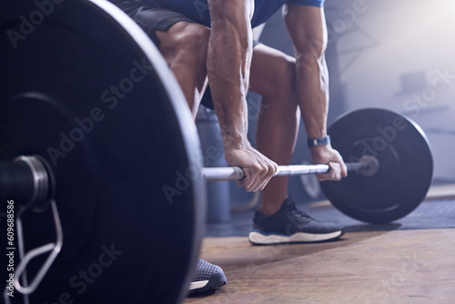 Gym, man and fitness with deadlift at the gym for a workout with close up for training with healthy body. Weightlifting, male trainer and club with strong muscles and hands for sport with equipment.