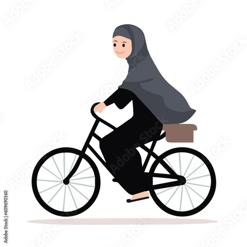 Happy muslim young woman with black veil ridding a bike on white background. Concept of muslim woman independence and autonomy