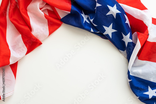 Fototapeta Naklejka Na Ścianę i Meble -  Closeup of American flag on plain background